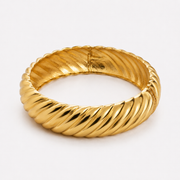 GOLD BEHAVIOR BANGLE