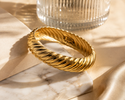 GOLD BEHAVIOR BANGLE
